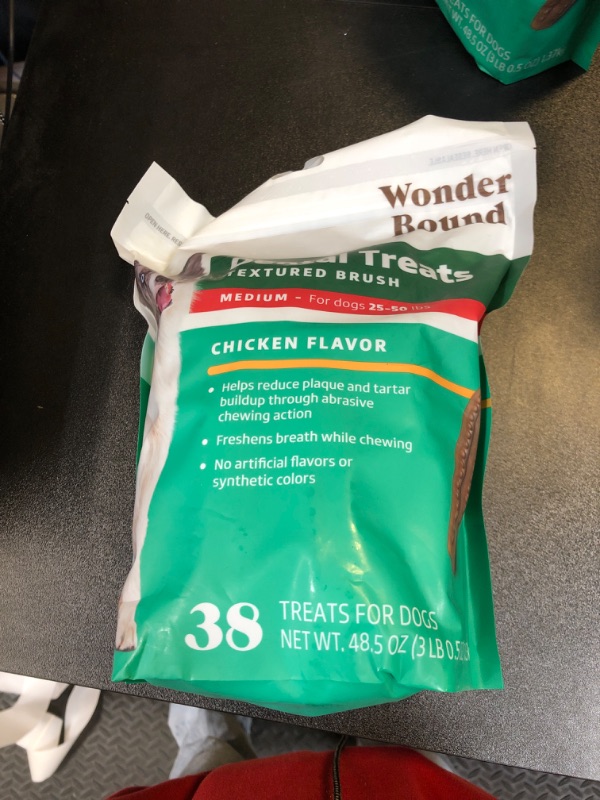 Photo 2 of Amazon Brand - Wonder Bound Dog Dental Treats for Medium Dogs (25-50 lbs), Real Chicken Flavor, Nubbed Texture for Plaque & Tartar Control, Freshens Breath While Chewing, 38 Count exp aug 2024