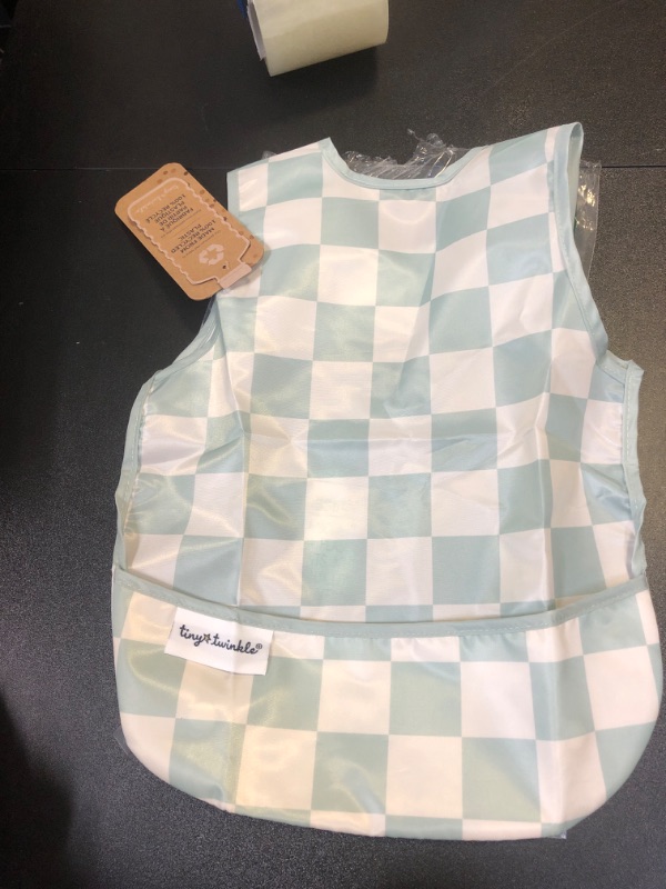 Photo 2 of Tiny Twinkle Mess Proof Baby Bib - Waterproof Baby Apron - Machine Washable - PVC, BPA, & Phthalate Free - Great Travel Bib for Baby Eating - Baby Food Bibs (Green Checkers, Small 6-24 Months)