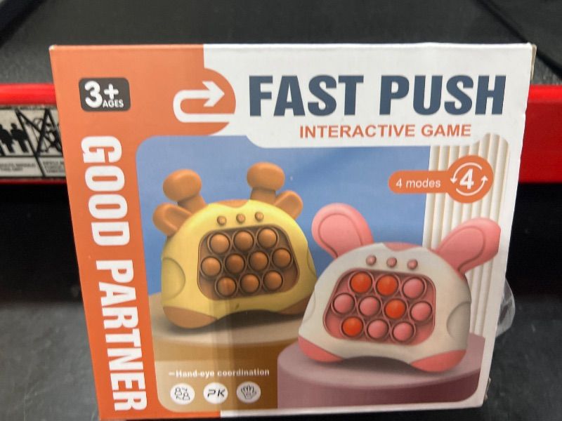 Photo 2 of Fast Push Bubble Game for Kids Adult Quick Push Handheld Games Controller with Light Up Bubble, Portable Puzzle Game Machine, Paty Favors Sensory Toy Gifts for 3-12 Kids Girl Boy Pink Rabbit