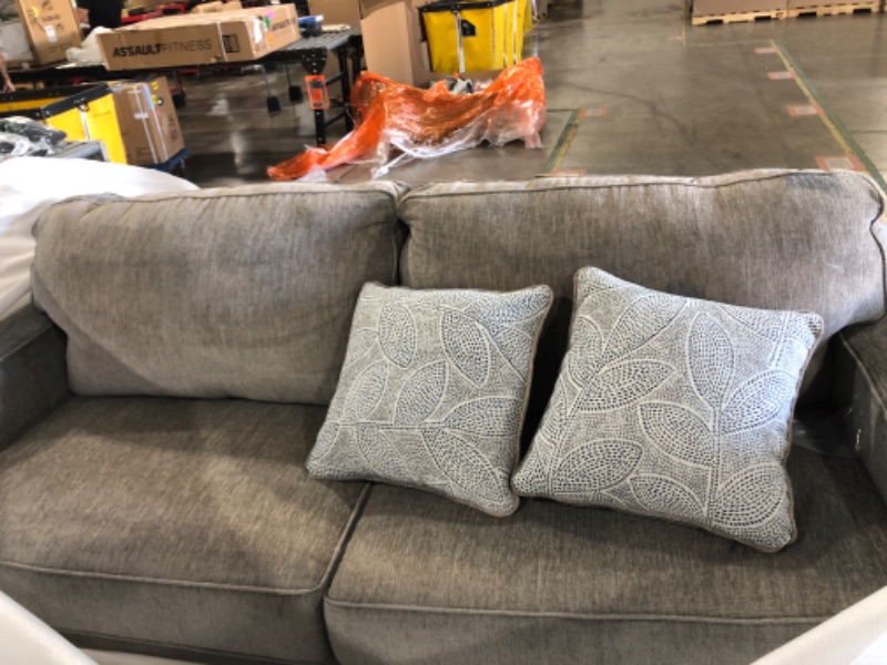 Photo 5 of  GREY SOFA WITH TWO BLUE AND WHITE PILLOWS