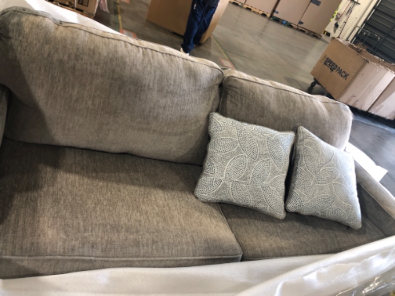 Photo 1 of  GREY SOFA WITH TWO BLUE AND WHITE PILLOWS