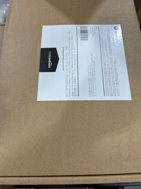 Photo 1 of Amazon Basics Room Darkening Blackout Window Curtain with Grommets, 42 x 96 Inches, White - Set of 2