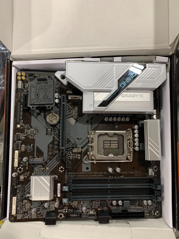 Photo 2 of GIGABYTE B760M Gaming Plus WiFi DDR4 LGA 1700 Intel B760 M-ATX Motherboard with DDR4, 2* M.2, PCIe 4.0, Front USB 3.2 Gen 1 Type-C, WiFi 6 GbE LAN, Q-Flash Plus, PCIe EZ-Latch