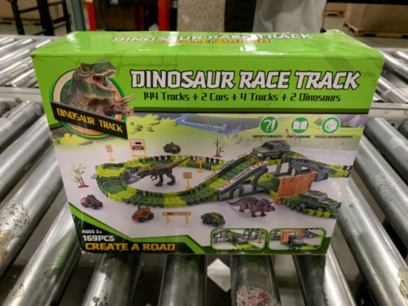 Photo 1 of iHaHa 169 PCS Dinosaur Race Car Track Toys for Kids Toddler Boys Ages 1-3 3-5 4-7, Dinosaur Race Tracks Toys with Light, Sound & Spray, Birthday Dinosaur Toys Gifts for 2 3 4 5 Year Old Boys