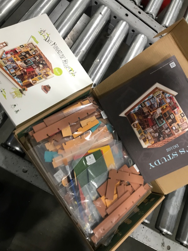 Photo 1 of Rolife DIY Miniature House Kit Sam's Study, Tiny House Kit for Adults to Build, Mini House Making Kit with Furnitures, Halloween/Christmas Decorations/Gifts for Family and Friends (Sam's Bookstore)