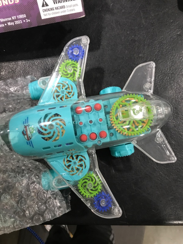 Photo 1 of ArtCreativity Light-Up Transparent Airplane Toy for Toddlers 1-3, Fun Bump-and-Go Plane Toy for Kids 3-5, with Colorful Moving Gears, Music, and LED Effects - Perfect Airplane Gift for Boys and Girls
