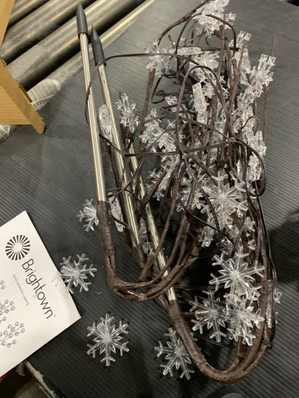 Photo 1 of Snowflake Lights Outdoor Pathway, 4 Packs Lighted Branches Christmas Yard Decor, Small Christmas Tree with Lights, Twig Branch Lights Outdoor Christmas Decorations Yard, White