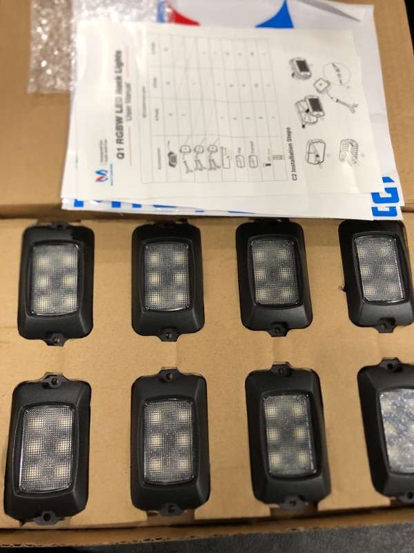 Photo 1 of MICTUNING Q1 RGBW LED Rock Lights, 12 Pods Underglow Multicolor Neon Light w/Wiring Switch Kit, Bluetooth App Controller & Remote Control Flashing Music Mode Wheel Well Light for Truck ATV UTV RZR SUV