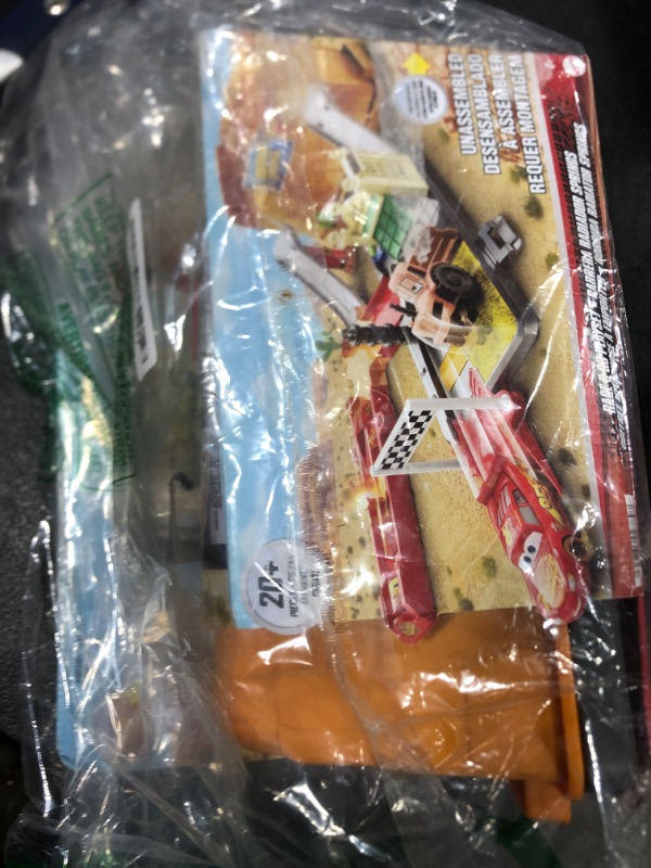 Photo 1 of Mattel Disney and Pixar Cars Track Set with Lightning McQueen Toy Car & Storage Tub, Race & Go Playset, 20+ Pieces Include Launcher