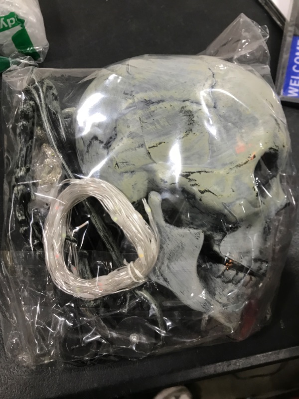 Photo 1 of Halloween Lighted Skeleton Set, Skull Arm Stakes with 1 Remote Green Lights (76 LEDs, 8 Light Modes & Timing Function), 2 Colorful Lights (3 Modes), Decorations for Outdoor Yard Garden Graveyard