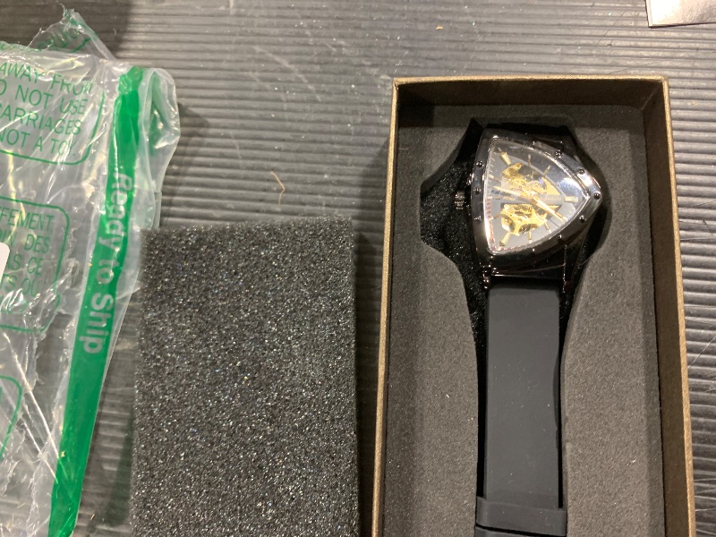 Photo 1 of FORSINING New Men Waterproof Skeleton Triangular Mechanical Wrist Watch with Silicone Strap (Gold and Black)