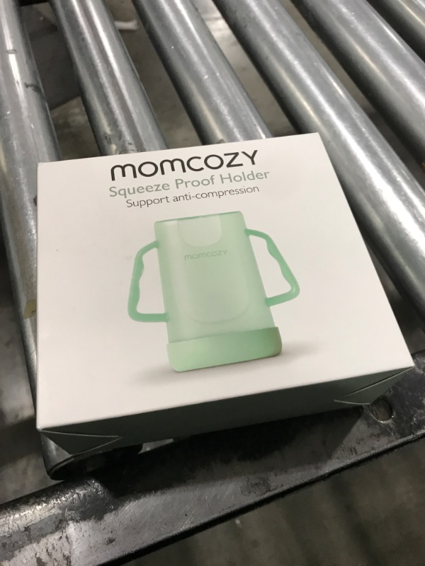 Photo 2 of Momcozy Squeeze Pouch Holder for Food Pouches and Drink Boxes, Baby Pouch Holder Allows Baby to Self-Feed and Avoid Messes, Baby Food Pouch Holder Handle is Easy to Grip, Comfortable, Green