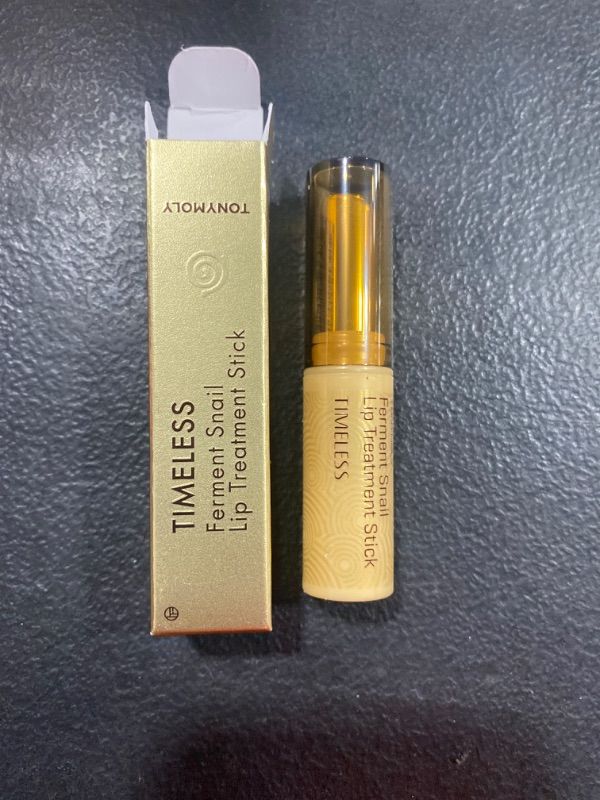 Photo 2 of TONYMOLY Timeless Ferment Snail Lip Treatment Stick unspecified expiration date 