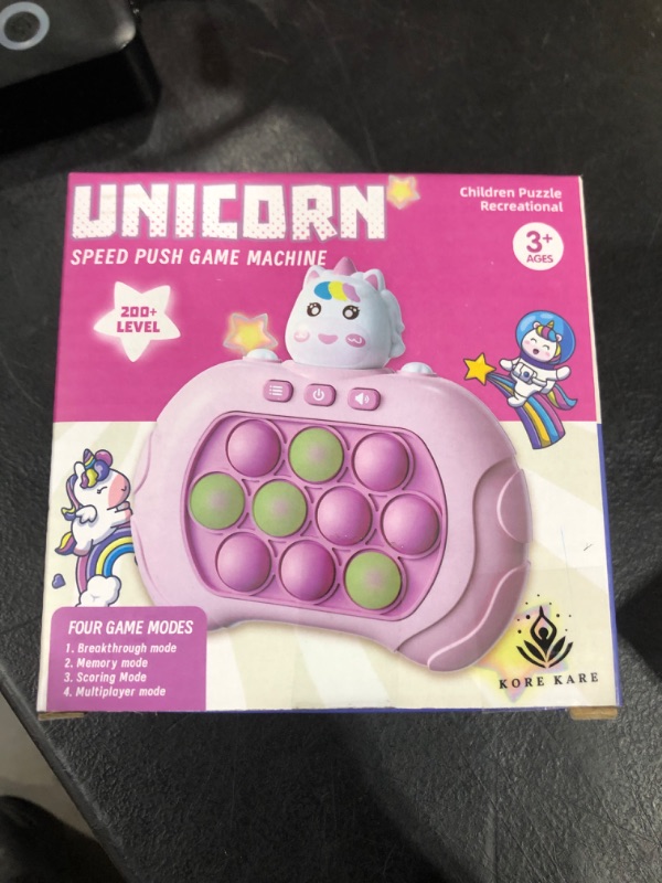 Photo 1 of KORE KARE Pop It Game Light Up Fidget Toy for Kids and Adults, Handheld, Quick Push Pop Game for Cognitive Skills Development, Excellent Audio Quality & Button Control Fast Push Game (Pink Unicorn)