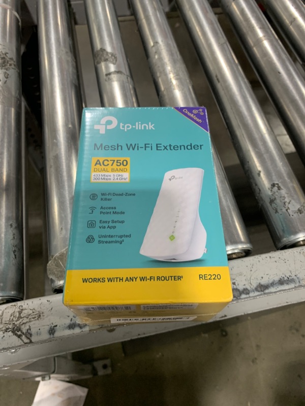 Photo 1 of TP-Link WiFi Extender with Ethernet Port