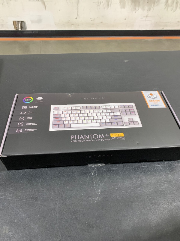 Photo 1 of TECWARE Phantom+ Elite 87 Key RGB Mechanical Gaming Keyboard, LED Backlit, Universal Hot-Swap, Wired and Wireless, 3 Mode Connectivity, Thocky Sounding, White Elite Wraith Orange