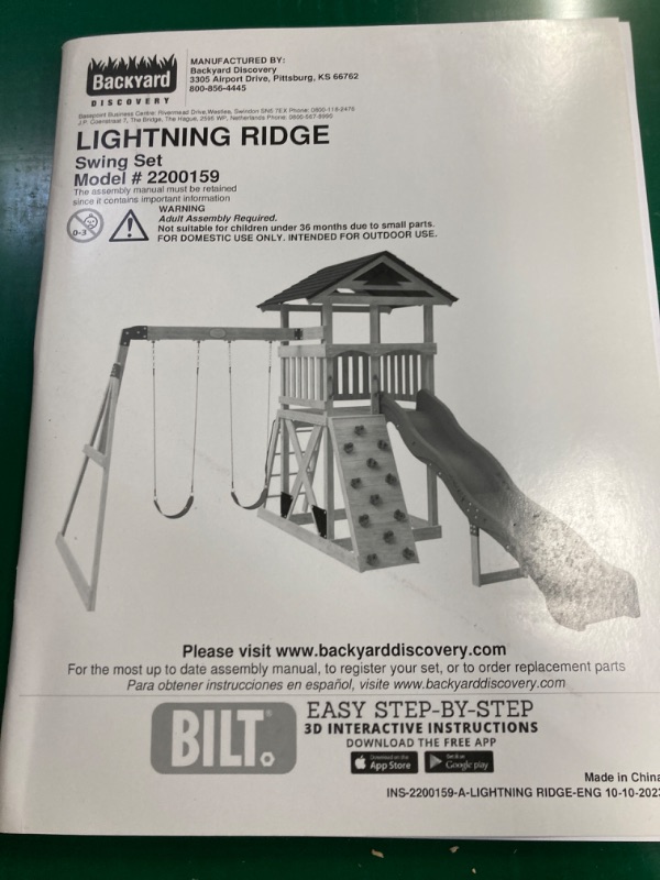Photo 1 of Backyard Discovery Lightning Ridge All Cedar Wooden Swing Set, Raised Clubhouse, 2 Belt Swings, 10 Inch Wave Slide, Ladder, Climbing Rock Wall