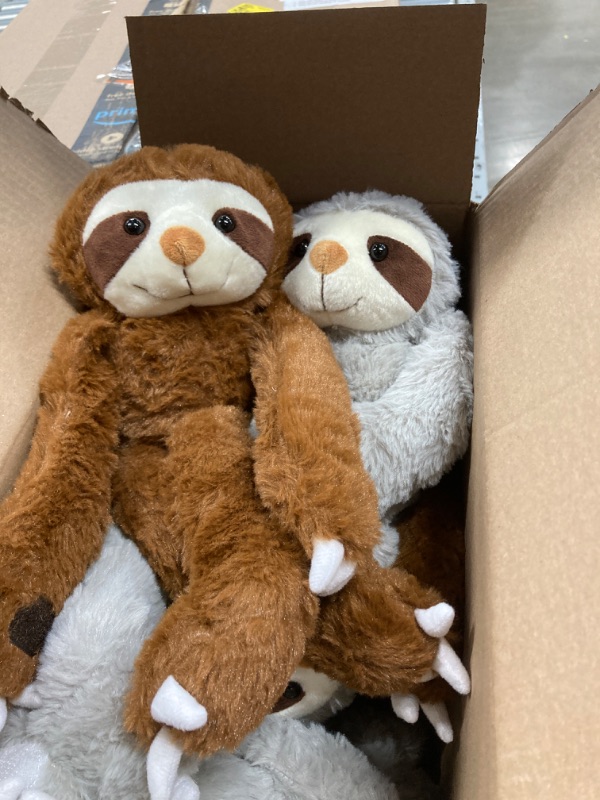 Photo 1 of 7 sloth stuffed animals w/ grey and brown ones