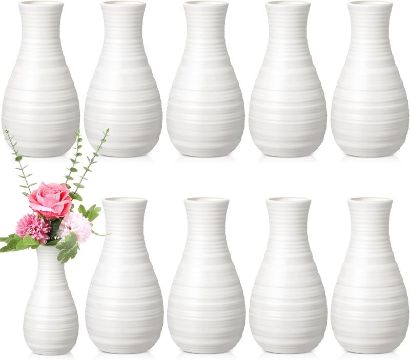 Photo 1 of  Composite Plastic Flower Vases Bulk White Small Tall Conic Floral Vases for Centerpieces Unbreakable Bud Vase for Wedding Party Living Room Decor (Simple)