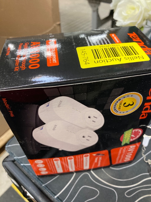 Photo 1 of Tenda AV1000 Powerline Etherne Adapter Kit with Gigabit Ports, Ethernet Over Power, Plug&Play, Power Saving, Power Outlet Passthrough, Ideal for Gaming (PH6)