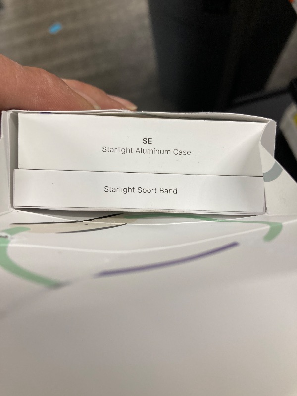 Photo 1 of Apple Watch SE (2nd Gen) [GPS 40mm] Smartwatch with Starlight Aluminium Case with Starlight Sport Band M/L. Fitness and Sleep Trackers