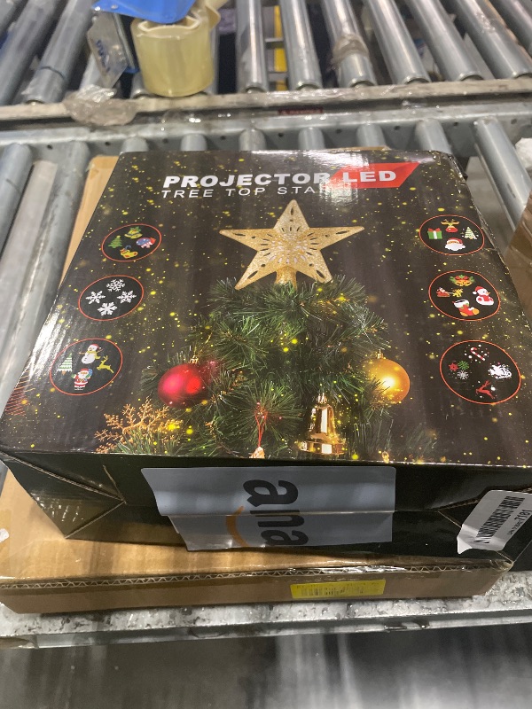 Photo 1 of Winpull Christmas Tree Topper Lighted with 6 Pattern Projection Modes, Christmas Tree Decorations Topper Built-in LED Projection Light, 3D Glitter Projector for Christmas Decorations (Gold)