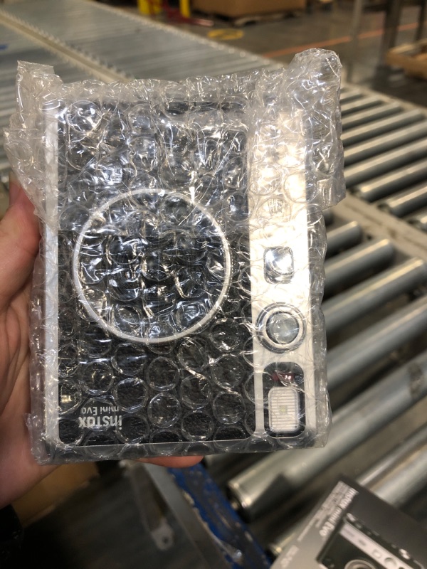 Photo 1 of Fujifilm Instax Mini EVO Instant Camera