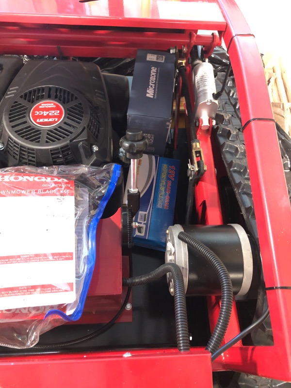 Photo 1 of Remote Control Lawn Mower Small Crawler Oil-Electric Hybrid Four-Wheel Drive Lawn Mowing and Weed Whacker(550)