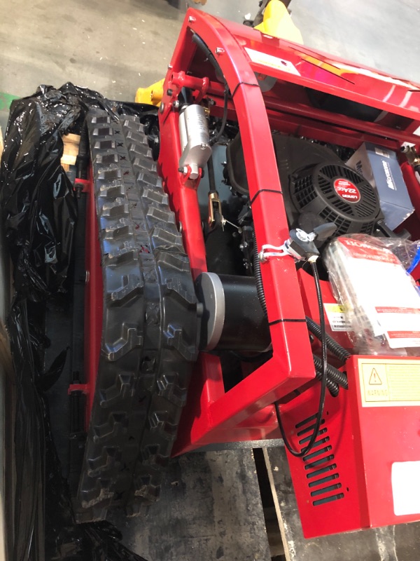 Photo 1 of Remote Control Lawn Mower Small Crawler Oil-Electric Hybrid Four-Wheel Drive Lawn Mowing and Weed Whacker(550)