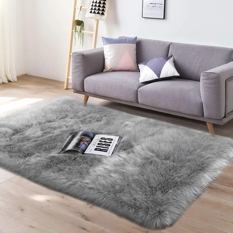 Photo 1 of ***USED***KORBLISS Ultra Soft Luxurious Faux Rabbit Fur 6x9 Area Rug, Machine Washable Non-Slip Indoor Carpet, Suitable for Bedroom, Dining Room, and Home. Pom-pom Dark Grey