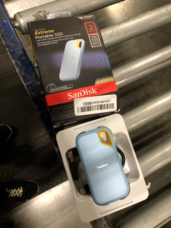 Photo 1 of SanDisk 2TB Extreme Portable SSD - Up to 1050MB/s, USB-C, USB 3.2 Gen 2, IP65 Water and dust Resistance, Updated Firmware, Sky Blue - External Solid State Drive - SDSSDE61-2T00-G25B