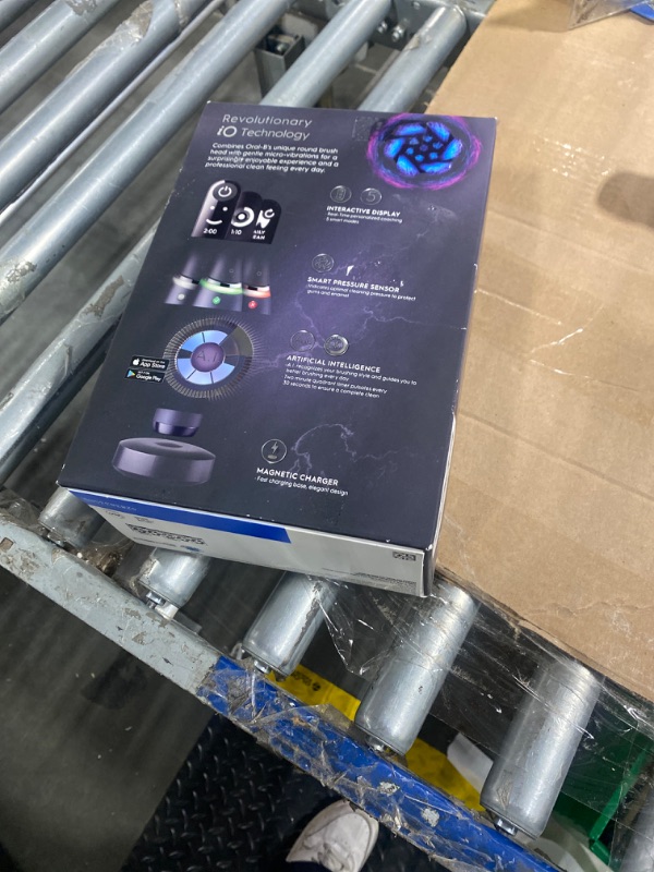 Photo 1 of Oral-B iO Deep Clean + Protect Rechargeable Electric Toothbrush, White with a iO Series 7 Toothbrush, 2 Replacement Brush Heads, and a Charging Travel Case