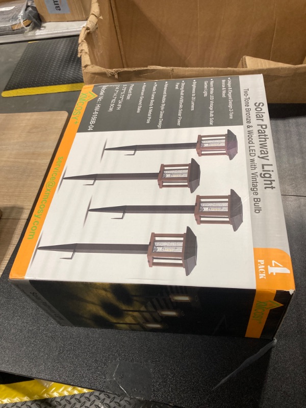 Photo 2 of ***uSED***XMCOSY+ Solar Lights Outdoor 20 LM LED with 2-Tone Bronze Tone & Wood Tone, Solar Garden Lights with Glass Metal, IP65 Waterproof Solar Powered for Yard Landscape Driveway Walkway (4 Pack, Warm White)