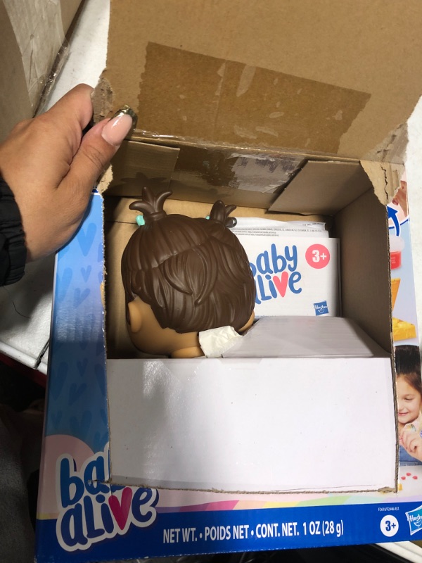 Photo 3 of ***USED***BABY ONLY***Baby Alive Lil Snacks Doll, Eats and Poops, Snack-Themed 8-Inch Baby Doll, Toy for Kids Ages 3 and Up, Brown Hair