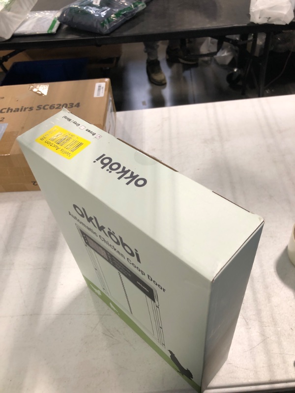 Photo 1 of Okkobi Automatic Chicken Coop Door Solar Powered - LCD Display - Chicken Coop Door with Remote Control, Light Sensor & Timer - Security & Peace of Mind: Anti-Pinch Function - 5-Year Protection