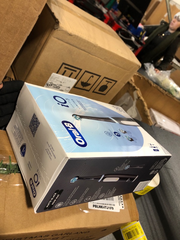 Photo 2 of **  SEALED**
Oral-B iO Deep Clean Rechargeable Electric Powered Toothbrush, Black with iO Series 3 Limited, 2 Brush Heads and Travel Case - Pressure Sensor to Protect Gums - 3 Cleaning Settings - 2 Minute Timer