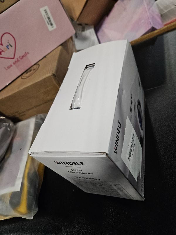 Photo 1 of Windele Upgraded 5G Wifi Bluetooth Projector, M8 Native 1080P Video Projector, Portable Outdoor Projector with Screen, Home Theater Mini Projector Compatible with HDMI/USB, Black & White