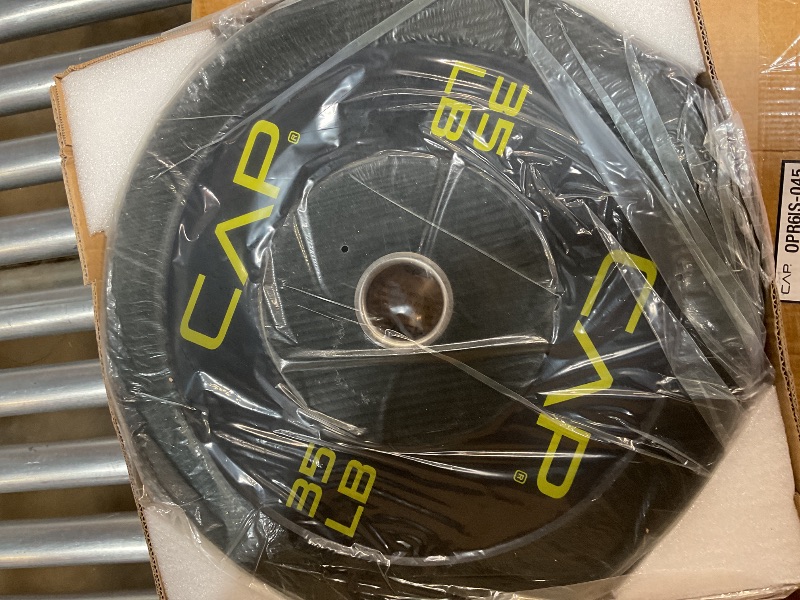 Photo 1 of CAP Barbell Economy Olympic Bumper Plate with Yellow Logo, Black, 35 lb Single