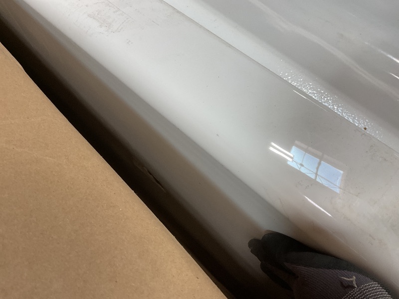 Photo 1 of **CHIPPED CORNER. 3 inch HOLE ON OUTSIDE**American Standard 2973102.020 Studio Integral Apron Bathtub Right Drain 60 in. x 30 in. in White