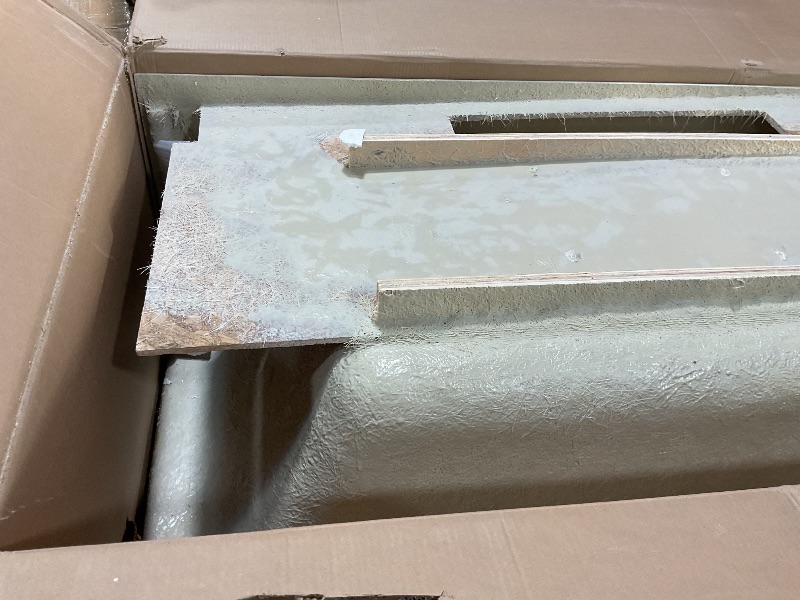 Photo 1 of **CHIPPED CORNER. 3 inch HOLE ON OUTSIDE**American Standard 2973102.020 Studio Integral Apron Bathtub Right Drain 60 in. x 30 in. in White