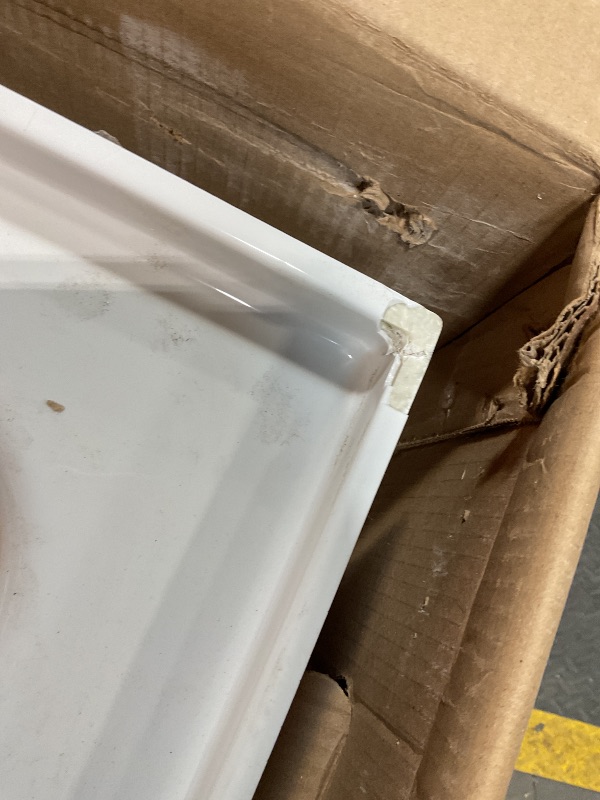 Photo 1 of **CHIPPED CORNER. 3 inch HOLE ON OUTSIDE**American Standard 2973102.020 Studio Integral Apron Bathtub Right Drain 60 in. x 30 in. in White