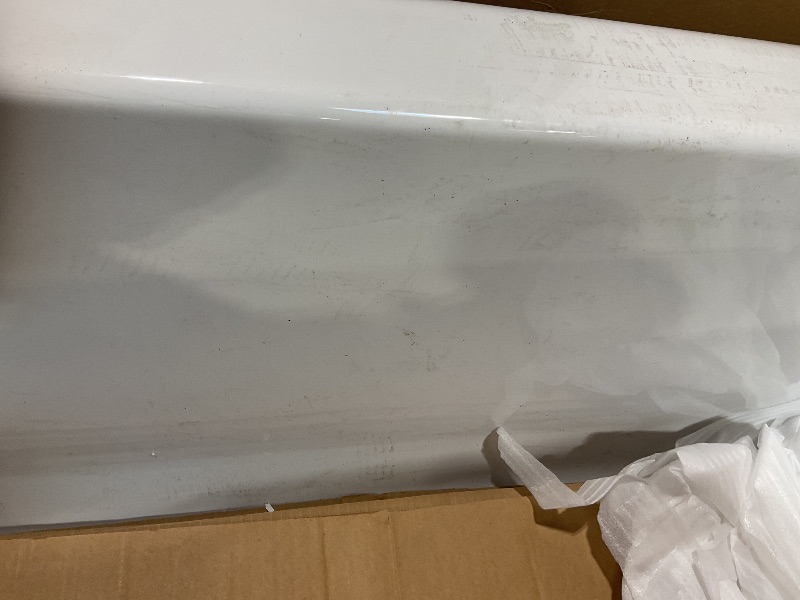 Photo 1 of **CHIPPED CORNER. 3 inch HOLE ON OUTSIDE**American Standard 2973102.020 Studio Integral Apron Bathtub Right Drain 60 in. x 30 in. in White