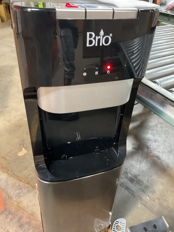 Photo 1 of ***POSSIBLY FOR PARTS/ LEAKS WHEN POWERED ON/ BOX HAS WATER DAMAGED**** Brio Bottom Loading Water Cooler Dispenser for 5 Gallon Bottles - 3 Temperatures with Hot, Room & Cold Spouts, Child Safety Lock, LED Display with Empty Bottle Alert, Stainless Steel