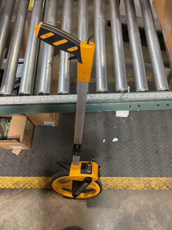 Photo 1 of *POSSIBLY FOR PARTS/DAMAGED/ BRAKE WORKS BUT LOCK FOR BRAKE DOES NOT, EXTRA TAPE MEASURE INCLUDED * Measuring Wheel With Handle Reset & Brake, Rolling Measuring Wheel in Feet for Construction, Survey, Collapsible Measure Wheel with Tape Measure and Canvas