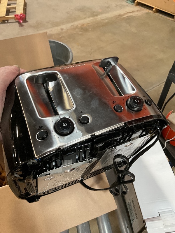 Photo 1 of **DAMAGE MINIMAL CAN STILL BE USED/SEEN IN PHOTO**BLACK+DECKER 4-Slice Toaster, Extra Wide Slots, 7 Shade Settings, 1400 Watts, Frozen and Bagel Buttons, Toast Shade Selector, Extra Lift