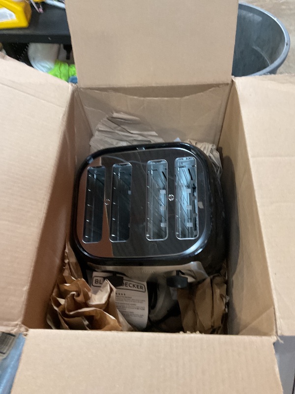 Photo 1 of **DAMAGE MINIMAL CAN STILL BE USED/SEEN IN PHOTO**BLACK+DECKER 4-Slice Toaster, Extra Wide Slots, 7 Shade Settings, 1400 Watts, Frozen and Bagel Buttons, Toast Shade Selector, Extra Lift