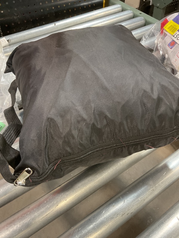 Photo 1 of **ZIPPER THREADS COMING LOOSE**Black zipper bag with a black cover inside.