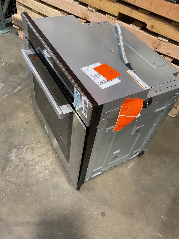 Photo 1 of **SCRATCHES. DIRT**(*COSMO COS-30ESWC 30 in. Haven Collection 5 cu. ft. Electric Wall Oven with True European Convection and Self Cleaning in Stainless Steel