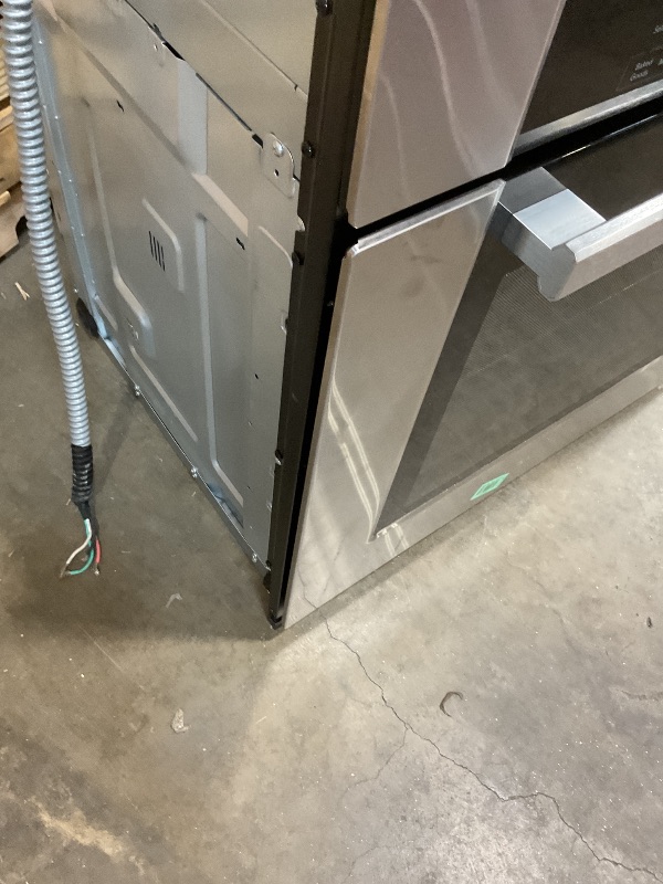 Photo 1 of **SCRATCHES. DIRT**(*COSMO COS-30ESWC 30 in. Haven Collection 5 cu. ft. Electric Wall Oven with True European Convection and Self Cleaning in Stainless Steel