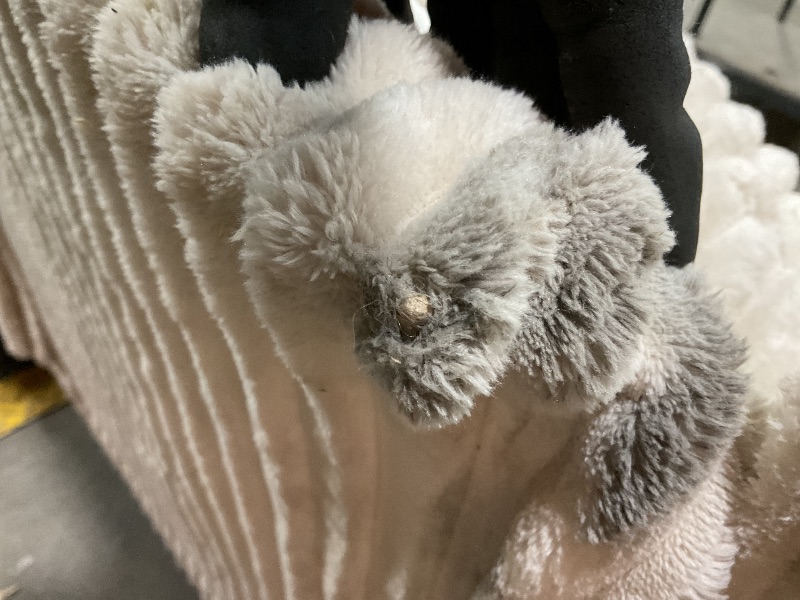 Photo 1 of **TEARS. MISSING LEGS ON MIDDLE SECTION** DIRT FROM TRANSPORT **White couch corner set.